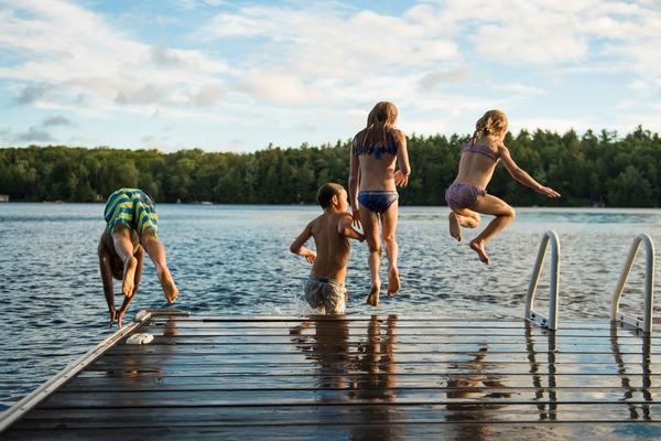 Kids Jumping oF Dock Into Lake